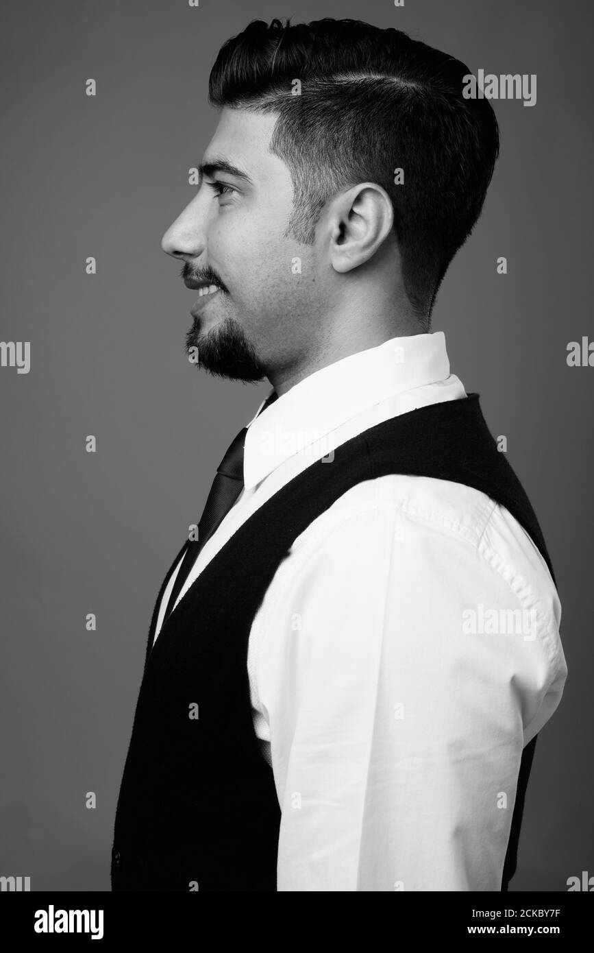 Side view smiling handsome businessman Black and White Stock Photos ...