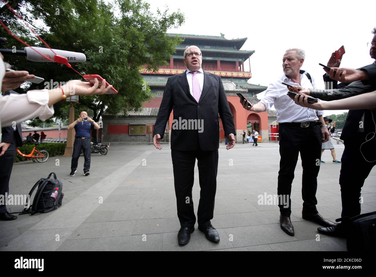 Germany's Economy Minister Peter Altmaier speaks to the media in front of the Drum Tower in Beijing, China June 19, 2019. REUTERS/Jason Lee Stock Photo