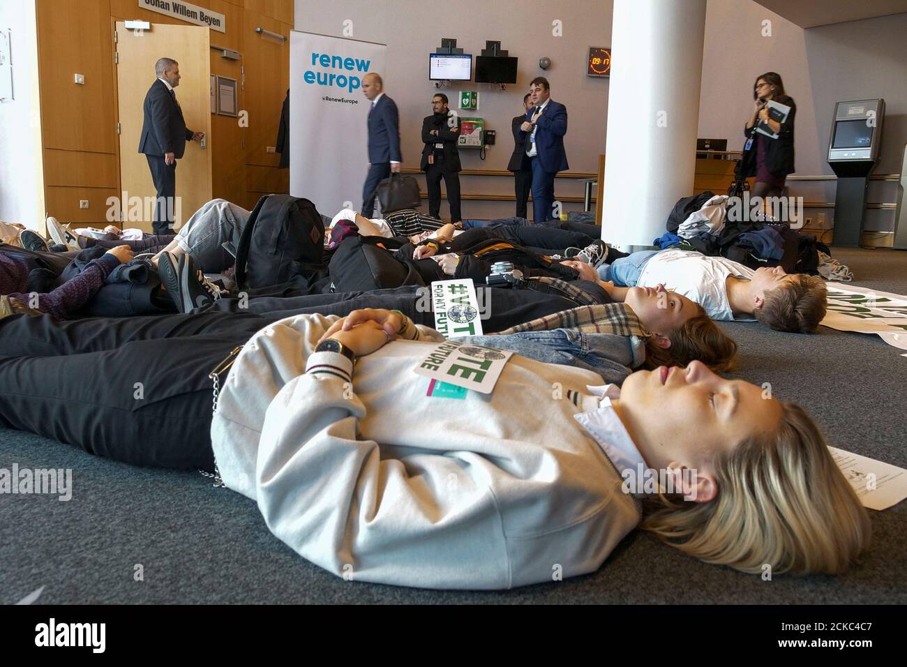Youth for Climate activists stage a die-in to demand more ambitious climate goals to be set by EU lawmakers, during a protest inside the EU Parliament in Brussels, Belgium, November 20, 2019. REUTERS/Christian Levaux Stock Photo
