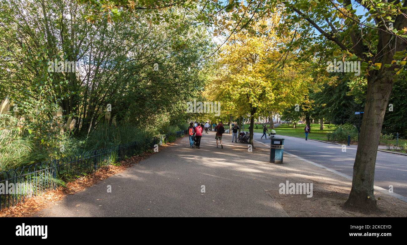People enjoying a walk in the scenic Victoria Park,London,UK Stock Photo