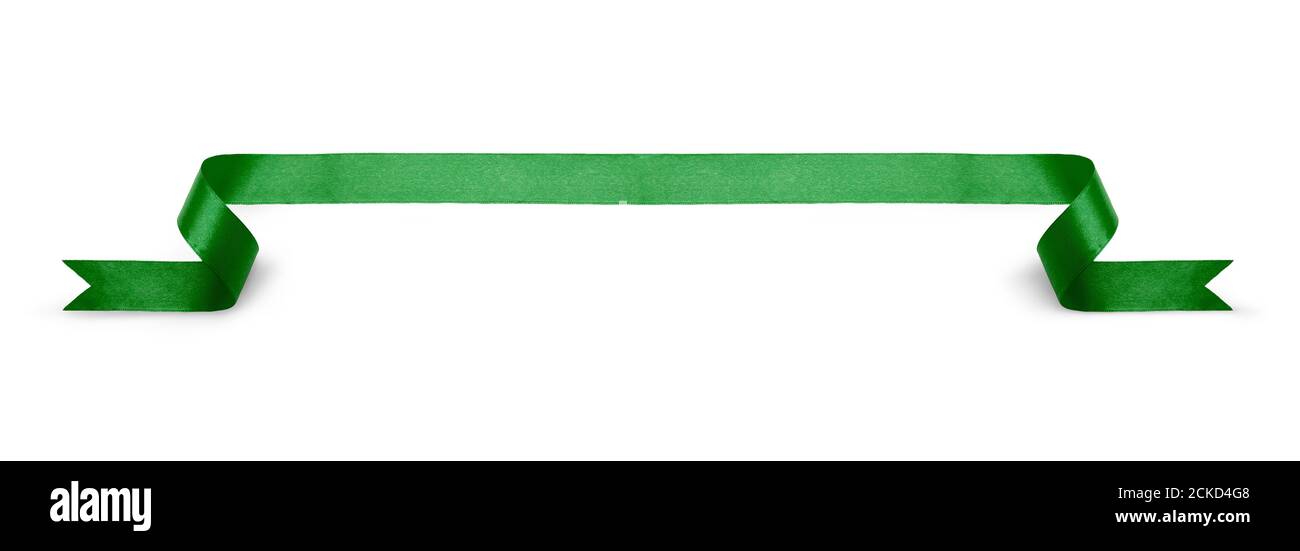 A curly green ribbon Christmas, birthday present banner isolated against a white background. Stock Photo