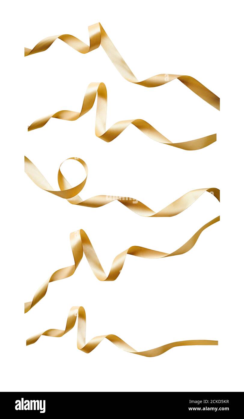 A collection of curly gold ribbon Christmas and birthday present banner set isolated against a white background. Stock Photo