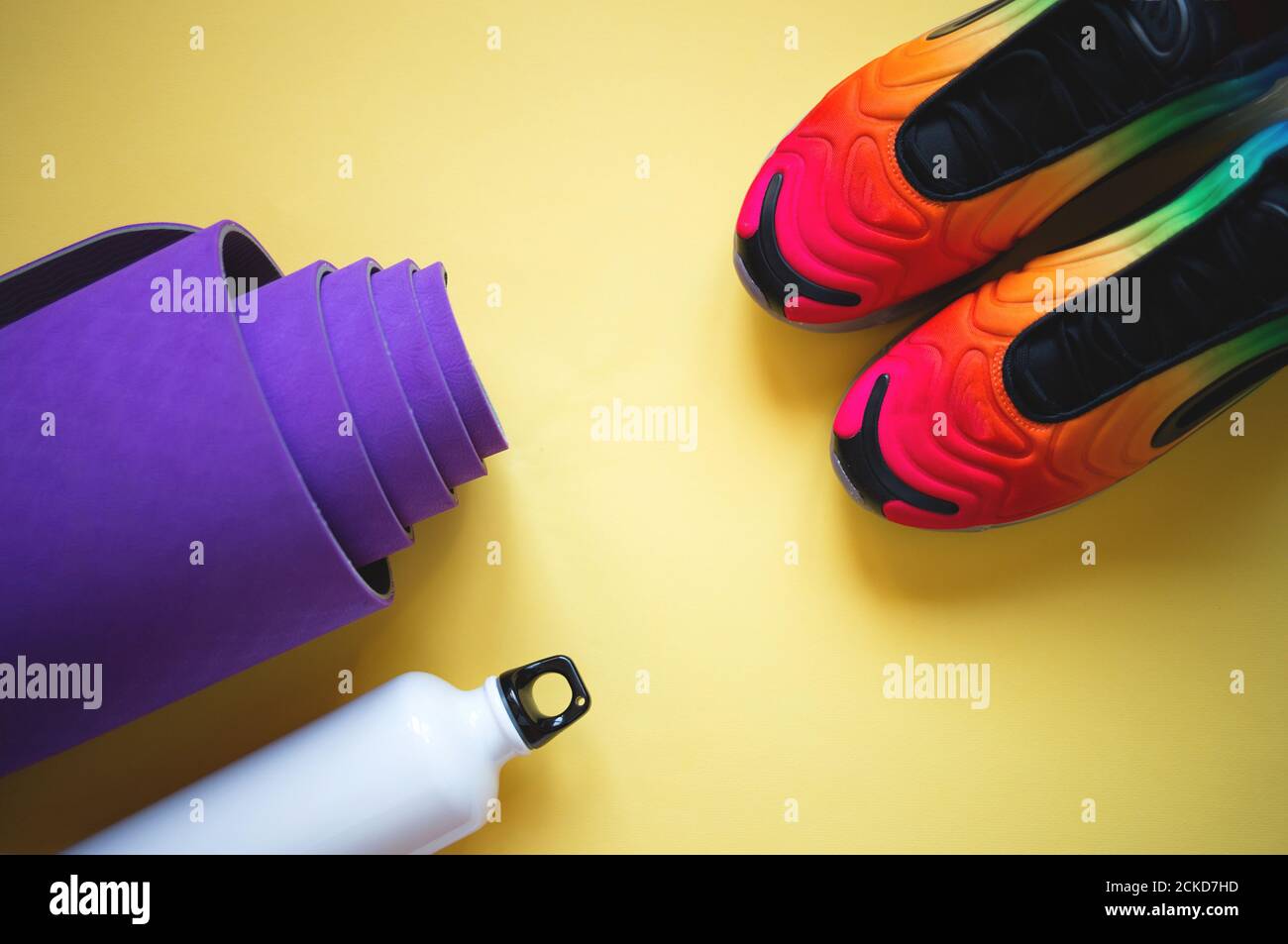 Bright blue yoga mat and bottle of water Stock Photo Alamy