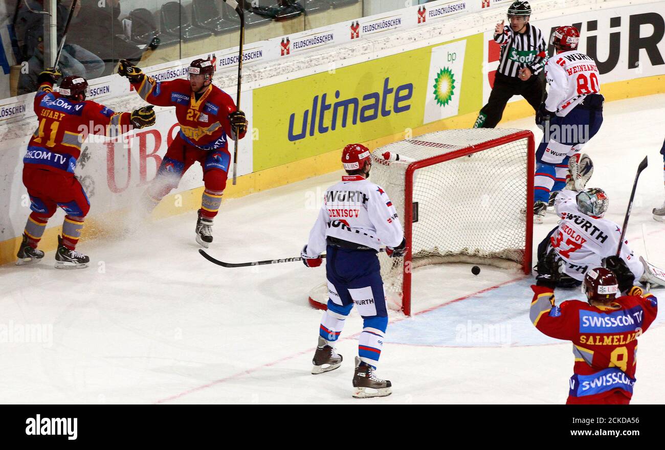 Thomas Deruns 2nd L And His Team Mate Paul Savary L Of Hc Geneve Servette Celebrate After He Scored During Their Semi Final Ice Hockey Match Against Ska St Peteresburg At The Spengler