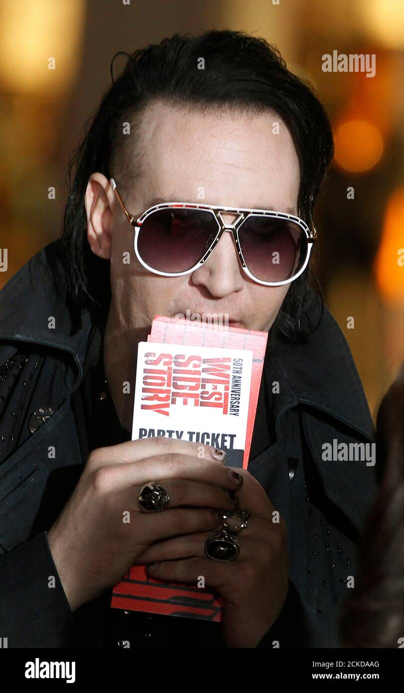 Singer Marilyn Manson, with party tickets in his hands, arrives as a guest  for a screening in honor of the "West Side Story: 50th Anniversary Edition"  Blu-ray release in Hollywood, California November