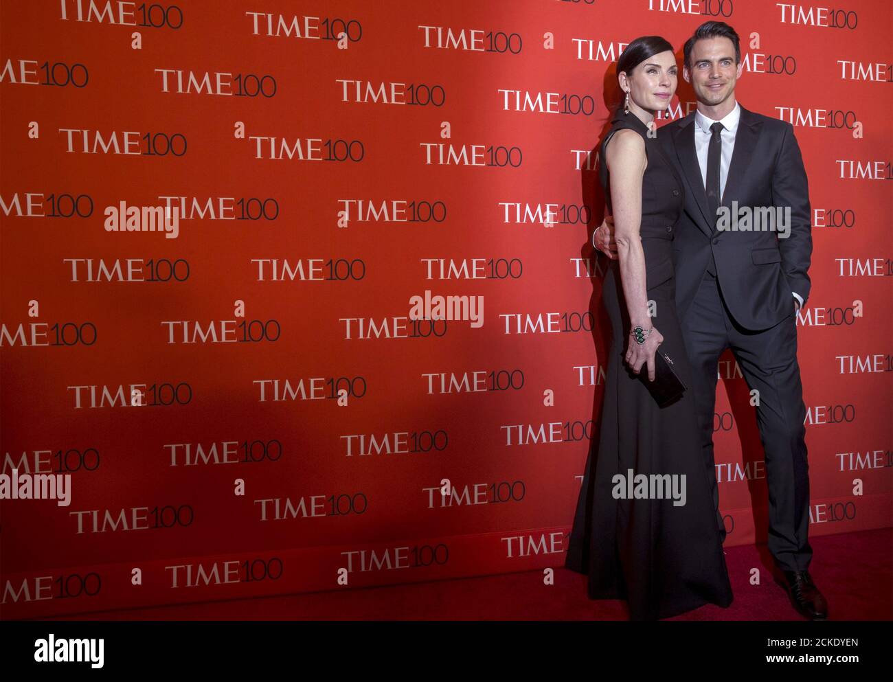 Actress Julianna Margulies (L) arrives with her husband Keith