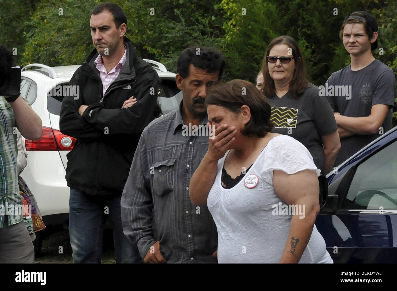 A family member reacts after hearing that a stay was denied for death row  inmate Richard Glossip outside the Oklahoma State Penitentiary in  McAlester, Oklahoma September 30, 2015. Glossip, 52, was found