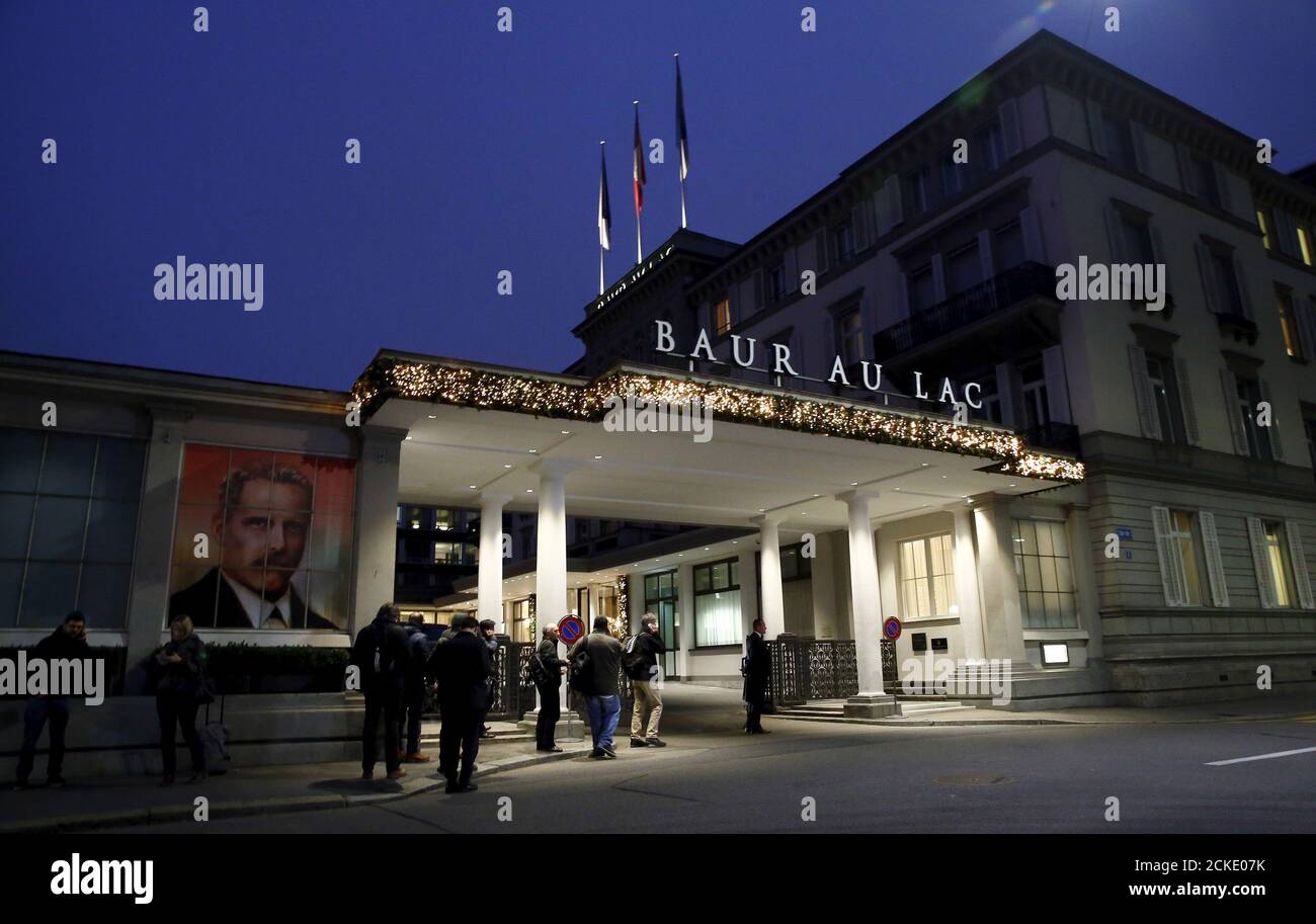 Members of the media stand outside the Baur au Lac hotel where Swiss police  arrested FIFA officials, in Zurich, Switzerland December 3, 2015. Law  enforcement officials made more arrests on Thursday in
