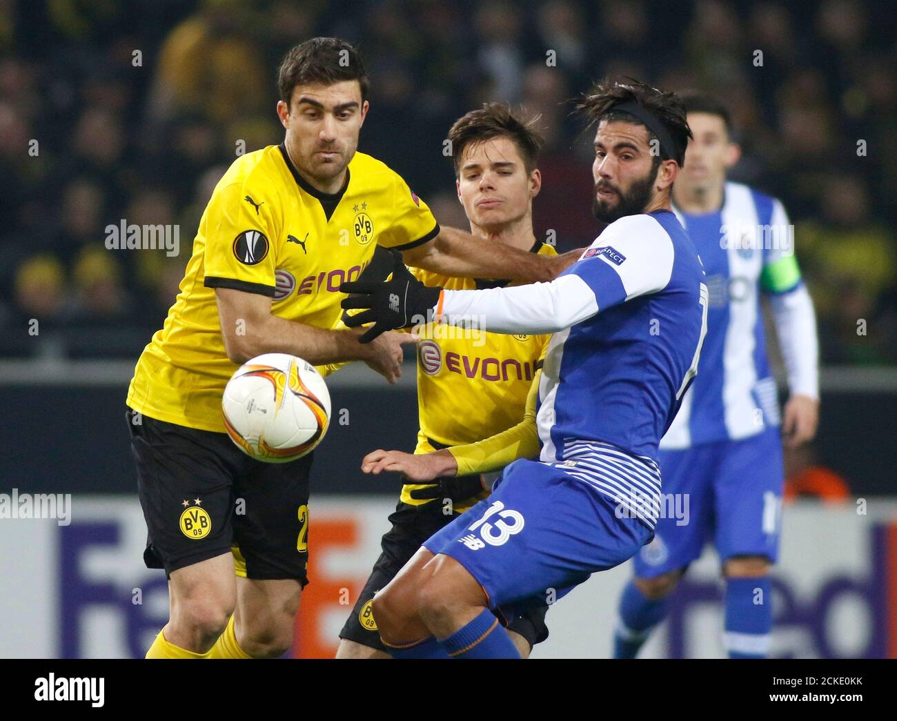 Football Soccer - Borussia Dortmund v FC Porto - UEFA Europa League Round  of 32 - Signal Iduna Park, Dortmund, Germany - 18/02/16 Borussia Dortmund's  Sokratis Papastathopoulos, Julian Weigl and FC Porto's