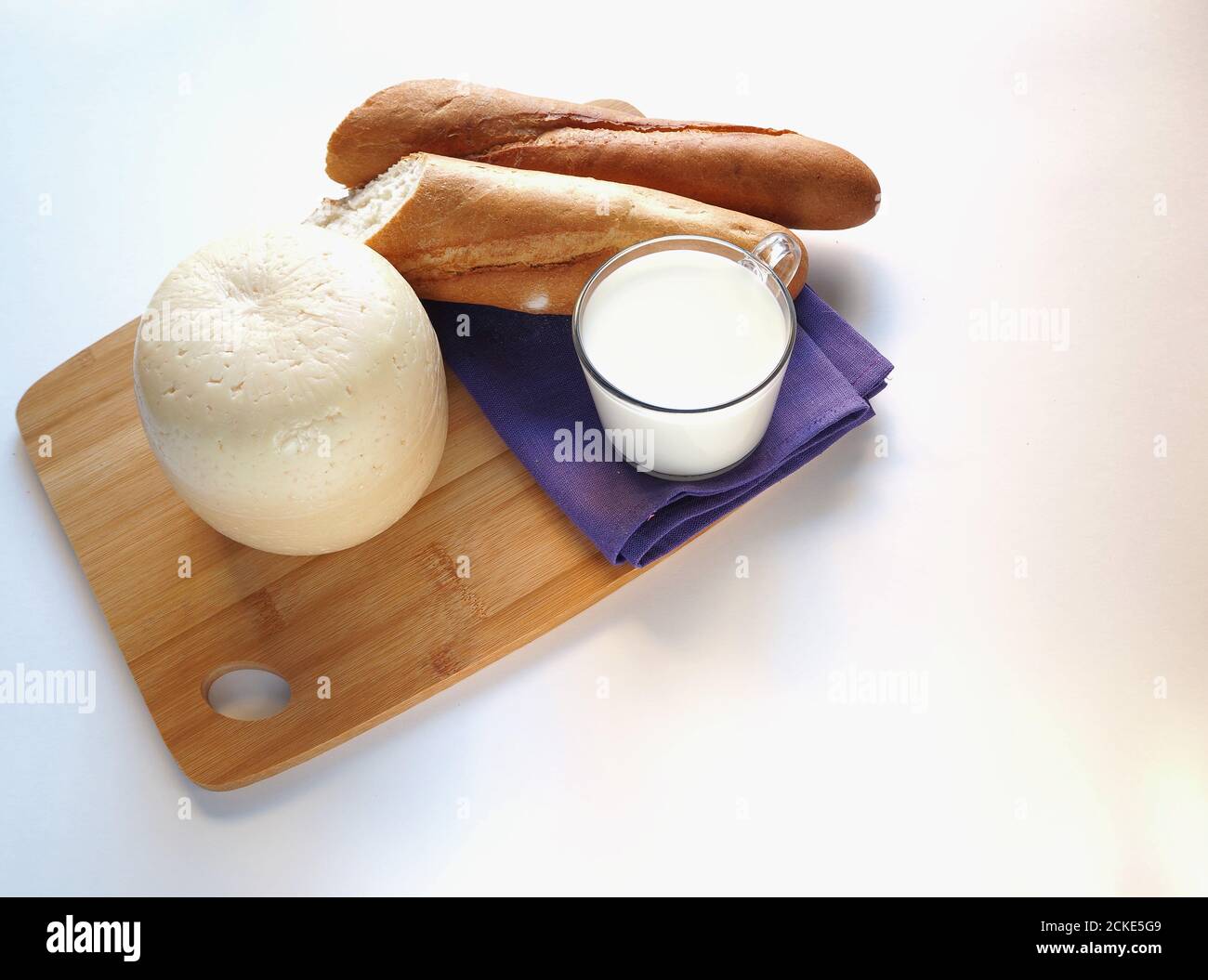 Cheese with bread and milk Stock Photo