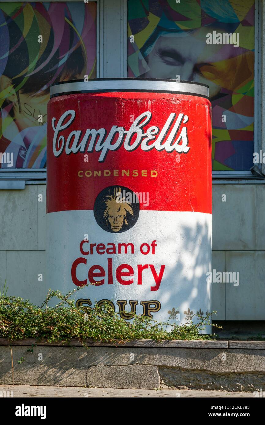 Portrait of artist Andy Warhol on a large can of Campbells soup outside the museum. Museum building in the background. Medzilaborce, Slovakia, Europe. Stock Photo