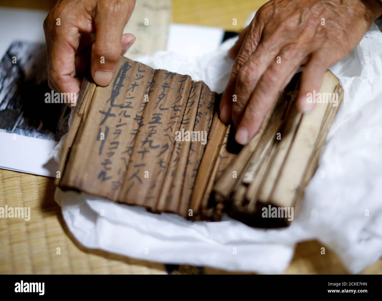 Shigenori Murakami 69 The Seventh Generation Head Of A Group Of Hidden Christians Shows A Crumbling 18th Century Scrolls Written Orasho Chants At His Home In Nagasaki Southern Japan November 3 19 Japan S