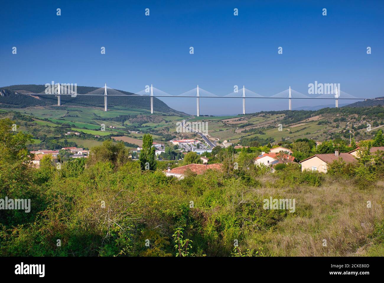 The complete Viaduc de Millau - Millau Viaduct from the Millau town, with all the pillars of the amazing suspension bridge, Aveyron, France Stock Photo