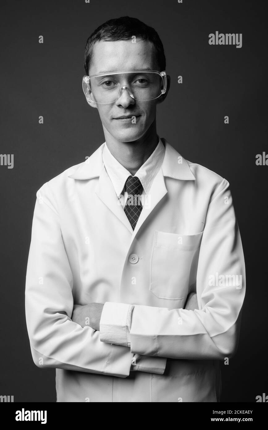 Portrait of young man doctor as scientist Stock Photo