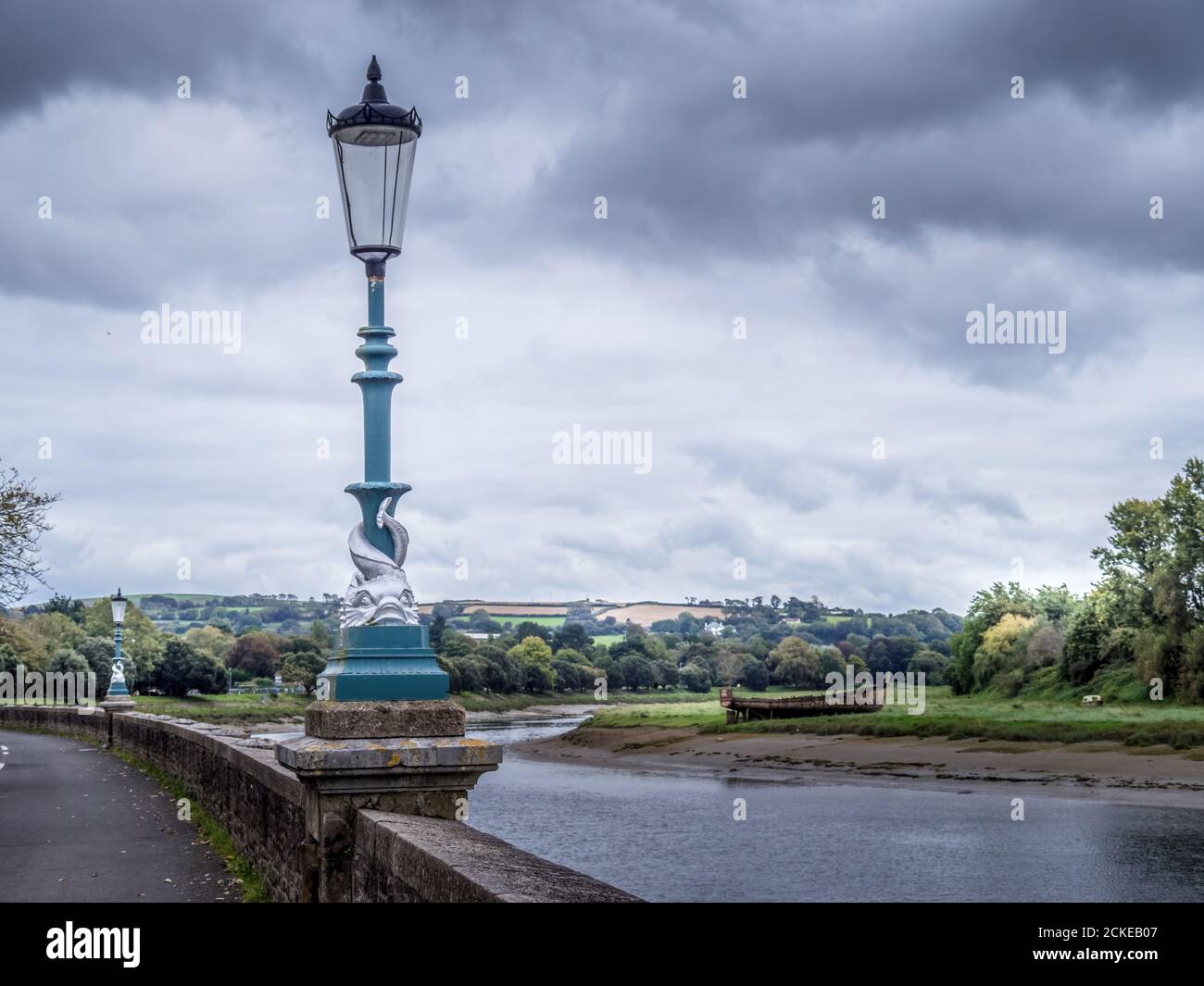 Legende Convergeren Samuel Dolphin lamp posts along the river Taw in Barnstaple, north Devon, UK Stock  Photo - Alamy