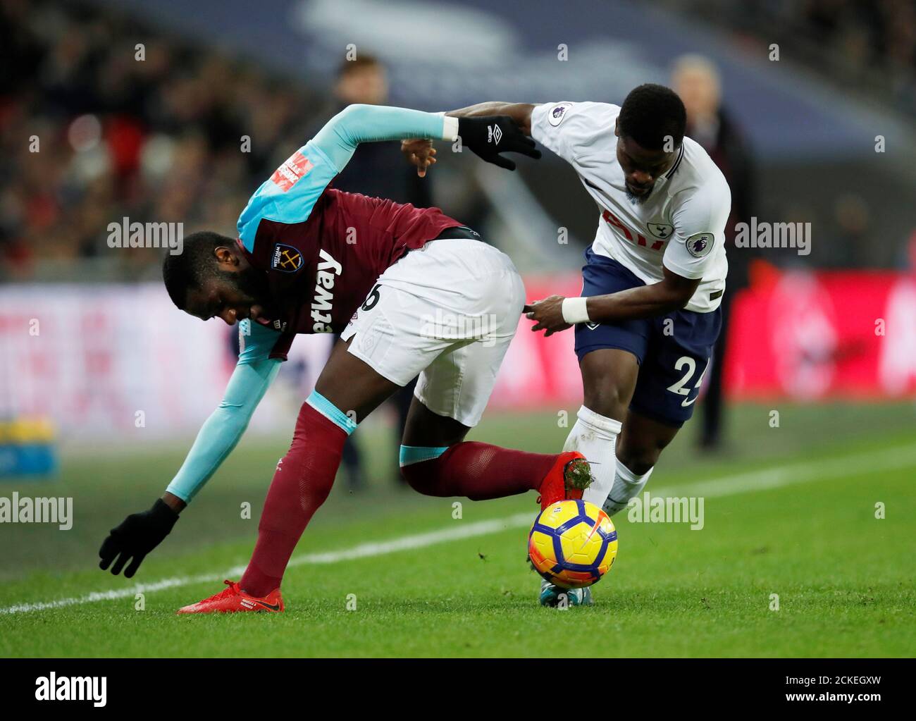 Soccer Football - Premier League - Tottenham Hotspur vs West Ham United - Wembley Stadium, London, Britain - January 4, 2018   Tottenham's Serge Aurier in action with West Ham United's Arthur Masuaku    REUTERS/Eddie Keogh    EDITORIAL USE ONLY. No use with unauthorized audio, video, data, fixture lists, club/league logos or 'live' services. Online in-match use limited to 75 images, no video emulation. No use in betting, games or single club/league/player publications.  Please contact your account representative for further details. Stock Photo