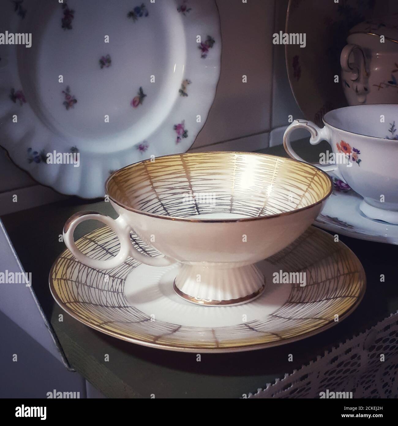 Old tea cup and old crockery. Stock Photo