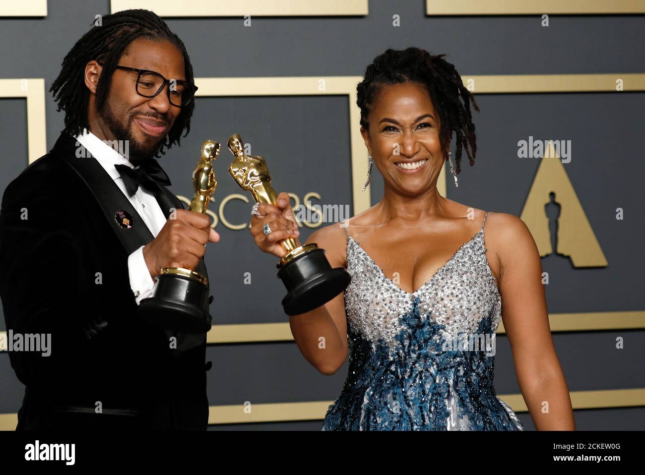 Matthew A. Cherry and Karen Rupert Toliver pose with the Oscar for Best Animated Short Film for Matthew A. Cherry and Karen Rupert Toliver pose with the Oscar for Best Animated Short Film for