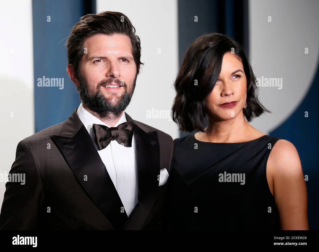 Adam Scott and Naomi Scott attend the Vanity Fair Oscar party in