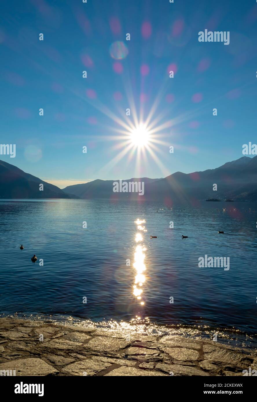 Waterfront with sunbeam mountain hi-res stock photography and images ...