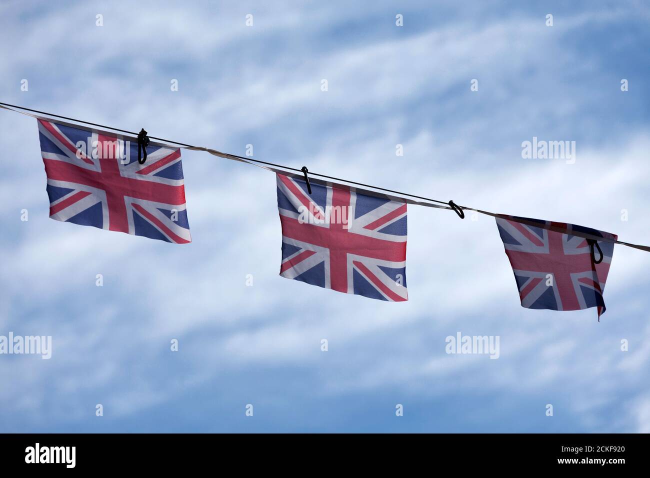 Red, white and blue british flag bunting to celebrate the VE Day. Stock Photo