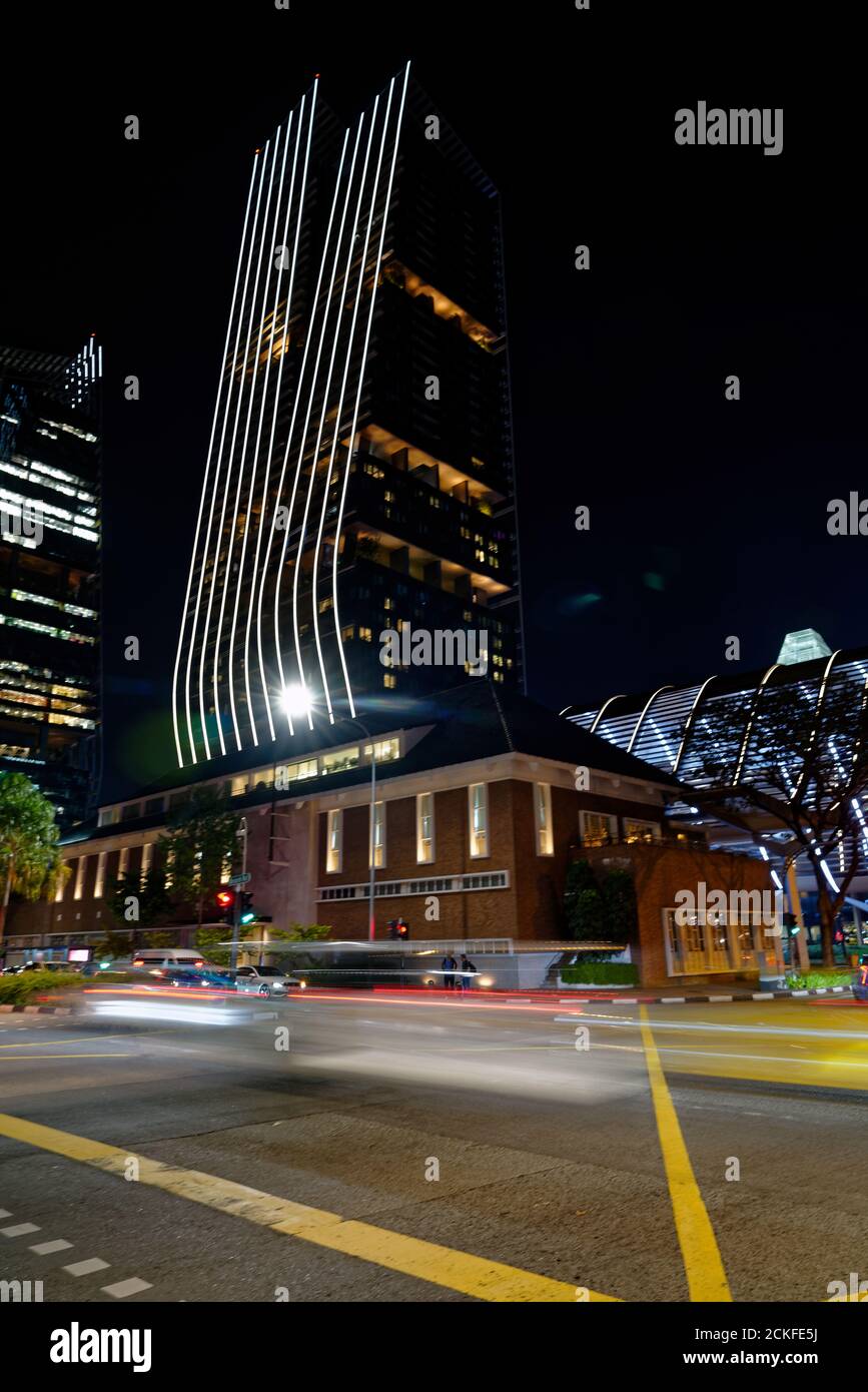 Beautiful vertical shot of a city in light at nighttime Stock Photo - Alamy