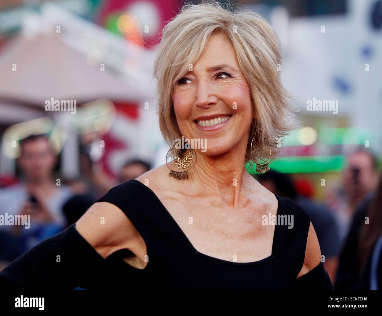 Actress Lin Shaye, one of the stars of the new film 'Insidious Chapter 2' poses at the film's premiere in Los Angeles, California September 10, 2013. REUTERS/Fred Prouser (UNITED STATES) Stock Photo