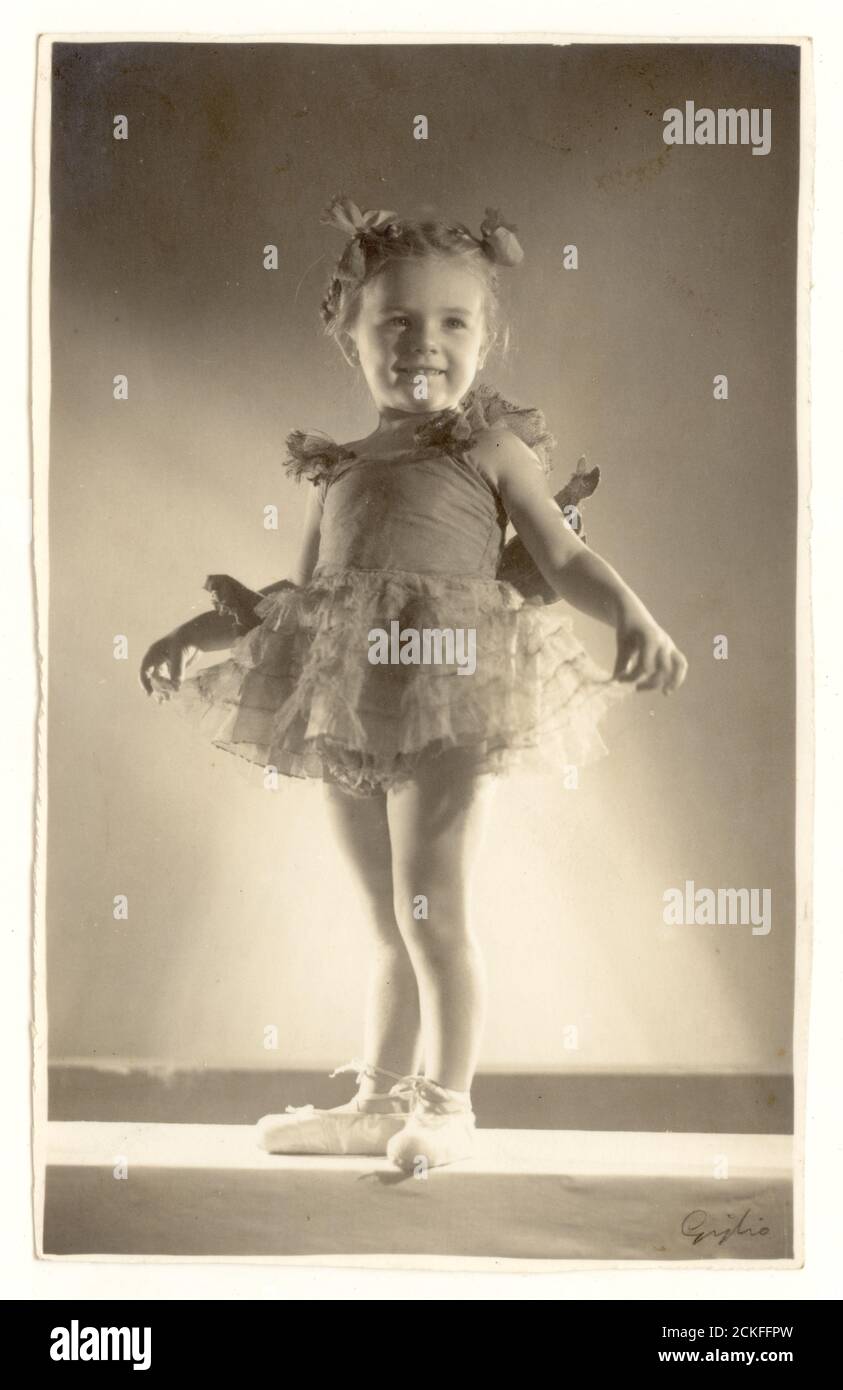 1950's studio portrait of young girl in her ballet costume, U.K. Stock Photo