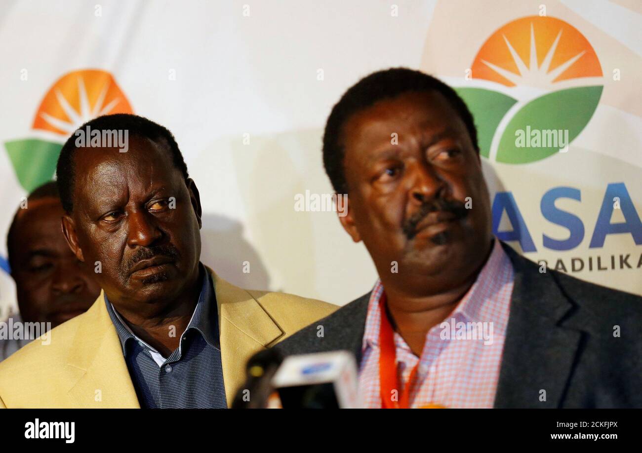 Kenyan Opposition Leader Raila Odinga The Presidential Candidate Of The National Super Alliance Nasa Coalition Listens As His Campaign Team Manager Musalia Mudavadi Addresses A News Conference In Nairobi Kenya August 10