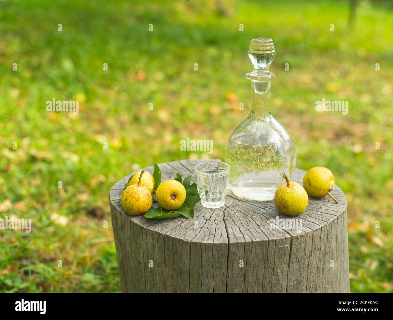 Pear Rakija Bottle and glass of pear rakia called