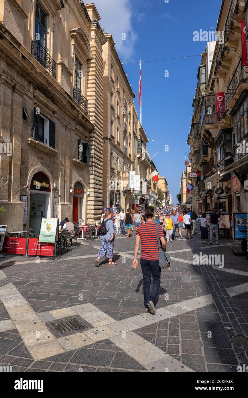 Valletta, Malta - October 12, 2019: People on the Republic Street in the capital city, main pedestrian boulevard Stock Photo