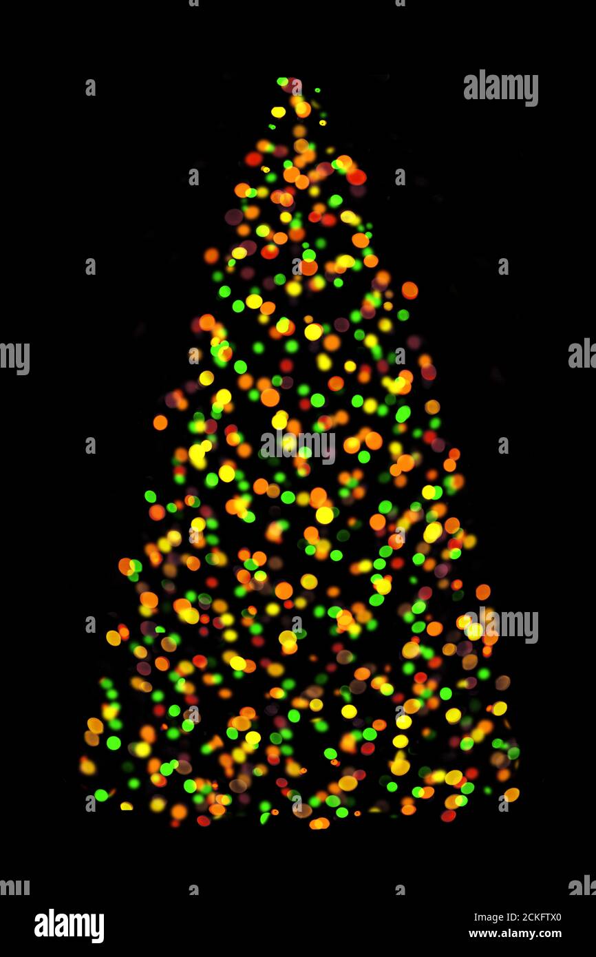 Blurred christmas tree lights isolated on black background Stock Photo