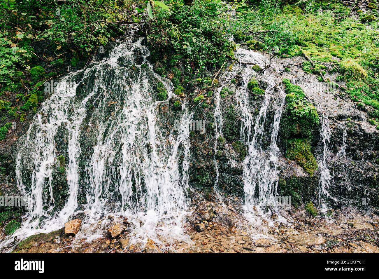 View of the waterfall spring Ladjevac in Serbia Stock Photo - Alamy