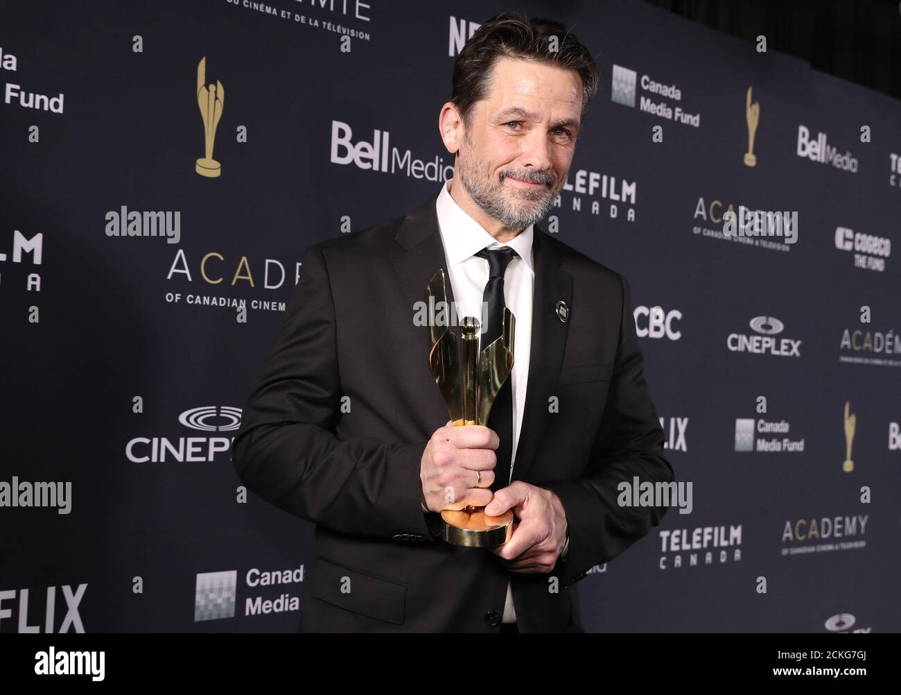 Murdoch Christmas Special 2022 Actor Yannick Bisson Poses With The Award For Best Actor In A Drama Program  Or Limited Series For "Murdoch Mysteries: Once Upon A Murdoch Christmas"  During The Canadian Screen Awards In Toronto,