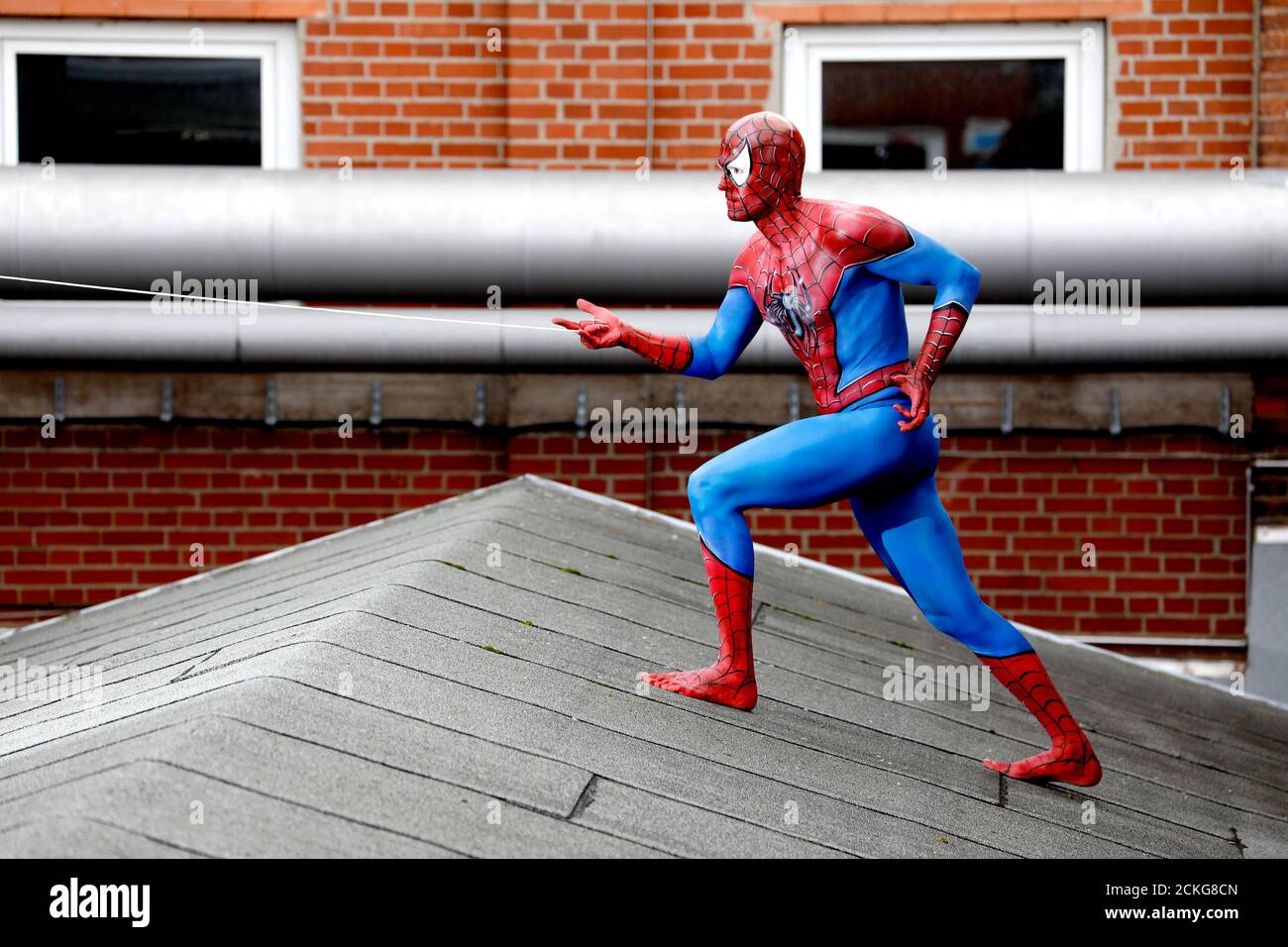 GEEK ART - Bodypainting and Transformaking: Spider-Man Photoshooting with Patrick Kiel in the Hefehof. Hameln, 15.09.2020 - A project by the photographer Tschiponnique Skupin and the bodypainters and transformers Enrico Lein | usage worldwide Stock Photo