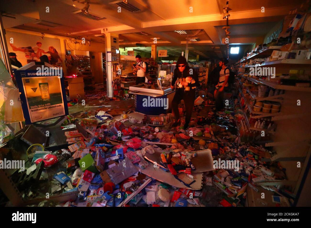 A shop is looted during anti-G20 protests on the first day of the G20 summit in Hamburg, Germany, July 7, 2017. REUTERS/Pawel Kopczynski Stock Photo