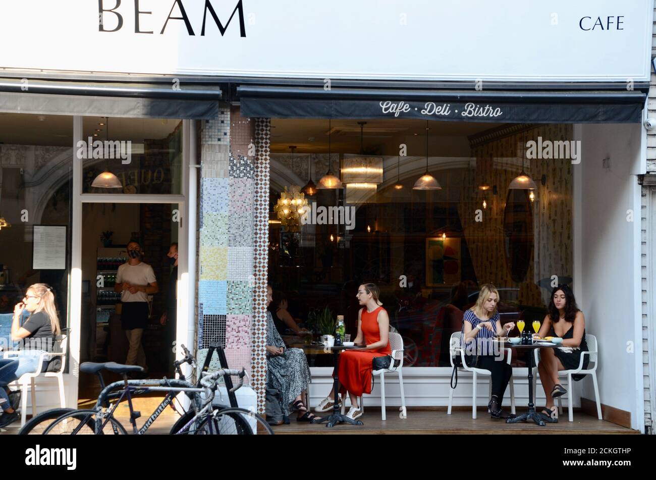 woman diners at beam cafe in crouch end north london N8 england UK