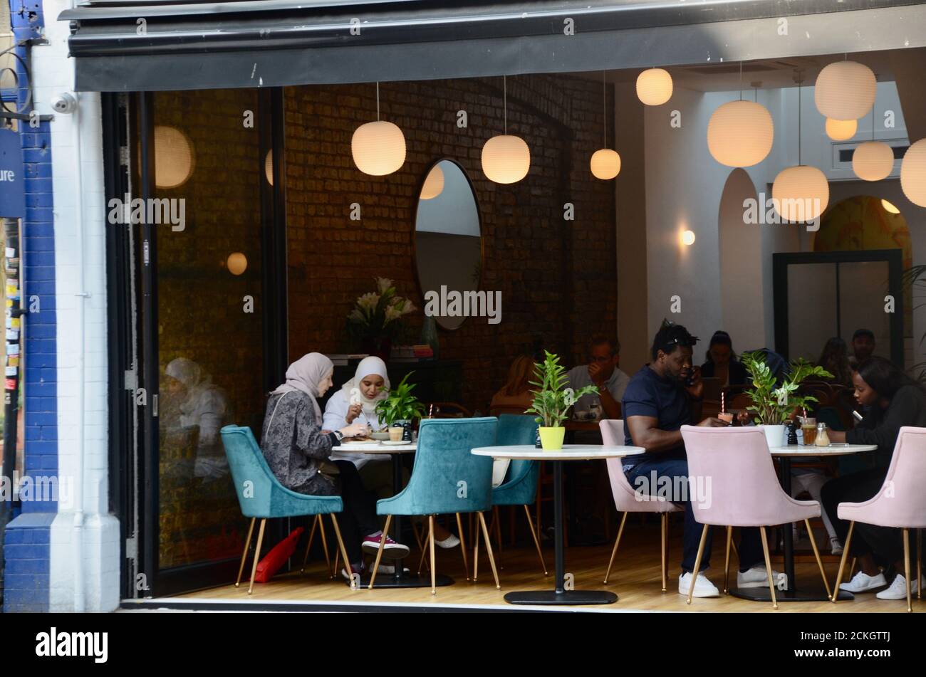 woman diners at beam cafe in crouch end north london N8 england UK Stock Photo