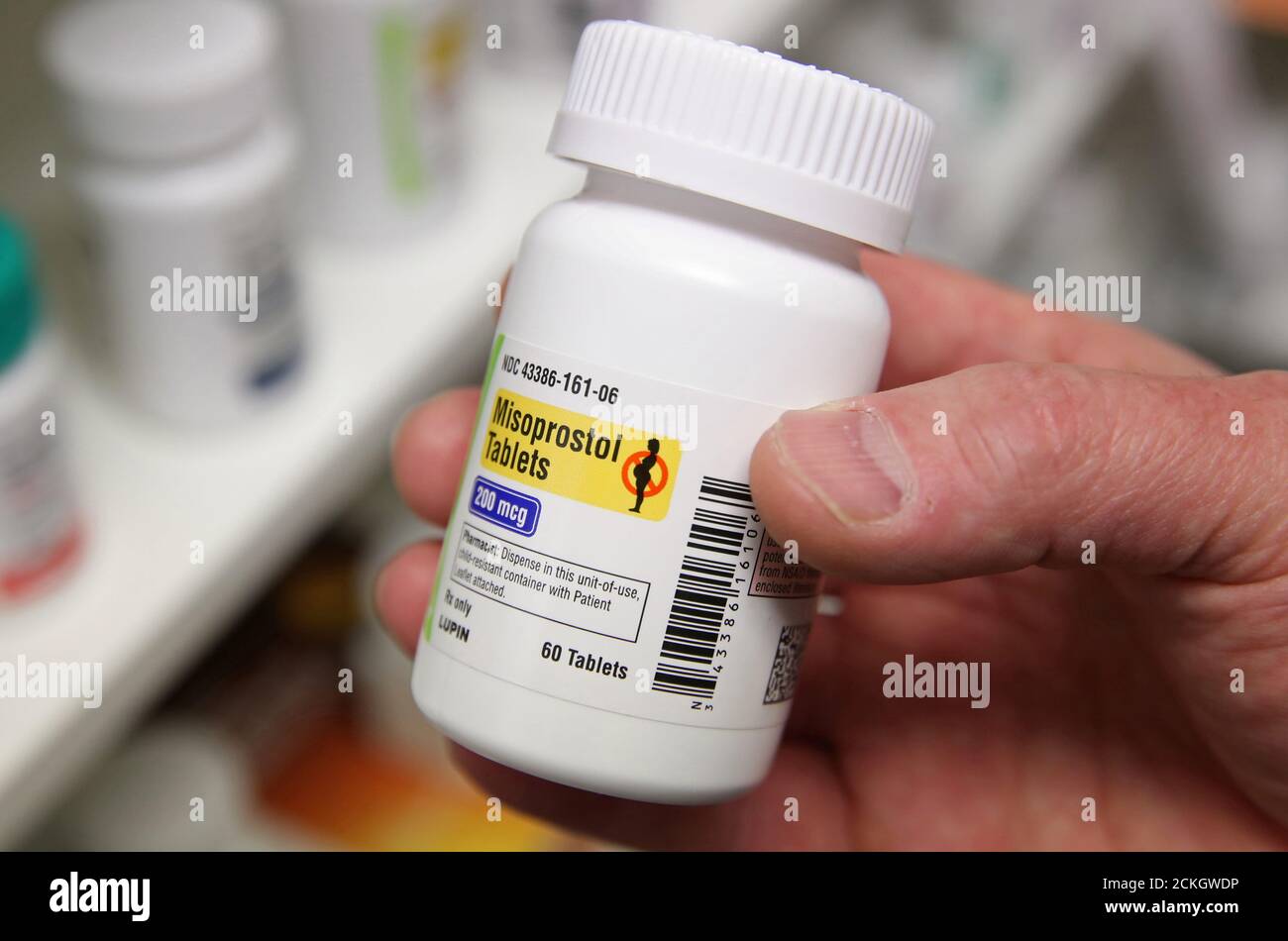 A pharmacist shows a bottle of the drug Misoprostol, made by Lupin Pharmaceuticals, at a pharmacy in Provo, Utah, U.S., June 19, 2019. Picture taken June 19, 2019.  REUTERS/George Frey Stock Photo