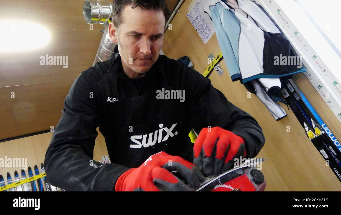 Wax technician Randy Gibbs of the Australian cross-country ski team works during the Pyeongchang 2018 Winter Olympics, in Pyeongchang, South Korea, February 20, 2018. Picture taken February 20, 2018. REUTERS/Philip O'Connor Stock Photo