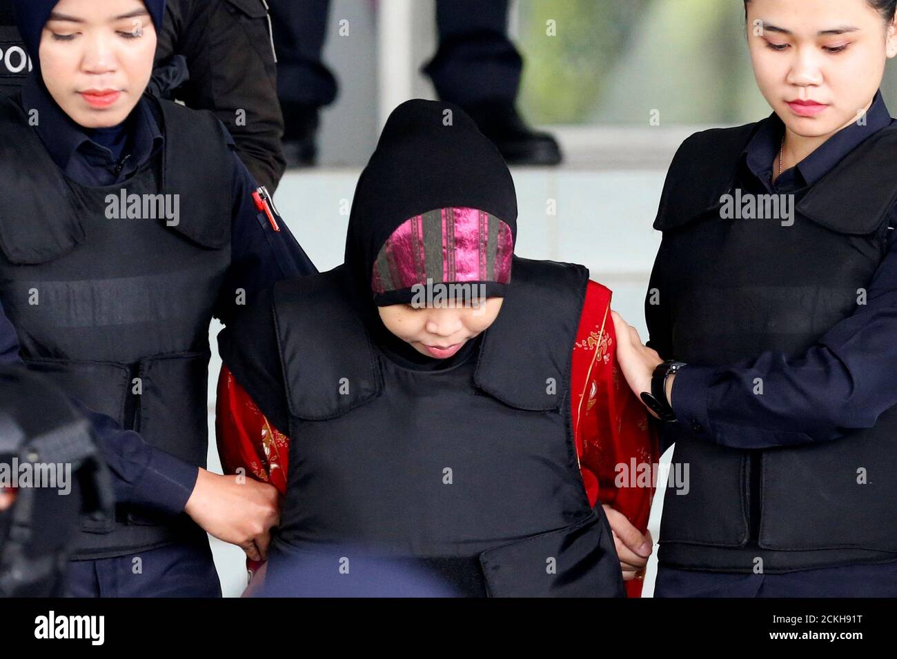 Indonesian Siti Aisyah Who Is On Trial For The Killing Of Kim Jong Nam The Estranged Half Brother Of North Korea S Leader Is Escorted As She Leaves The Shah Alam High Court On