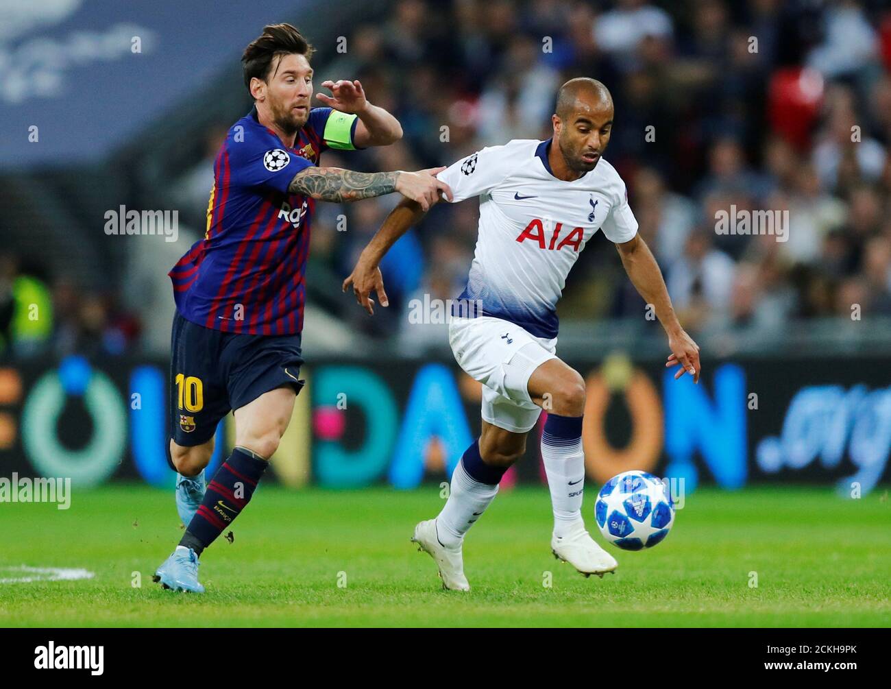 Soccer Football - Champions League - Group Stage - Group B - Tottenham Hotspur v FC Barcelona - Wembley Stadium, London, Britain - October 3, 2018  Barcelona's Lionel Messi in action with Tottenham's Lucas Moura       REUTERS/Eddie Keogh Stock Photo