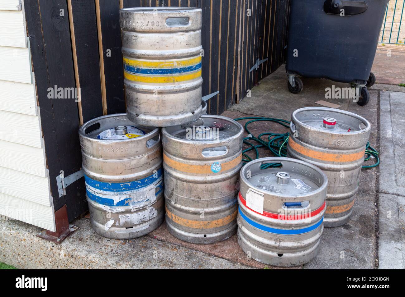 empty beer barrels or beer kegs outside a pub Stock Photo