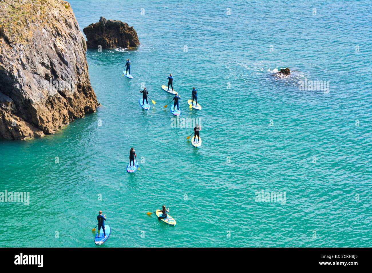 Paddle boarding in Pembrokeshire Coast National Park in Wales, UK Stock