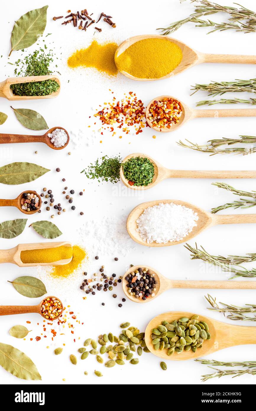 Layout of various spices in spoons. Top view, copy space Stock Photo ...