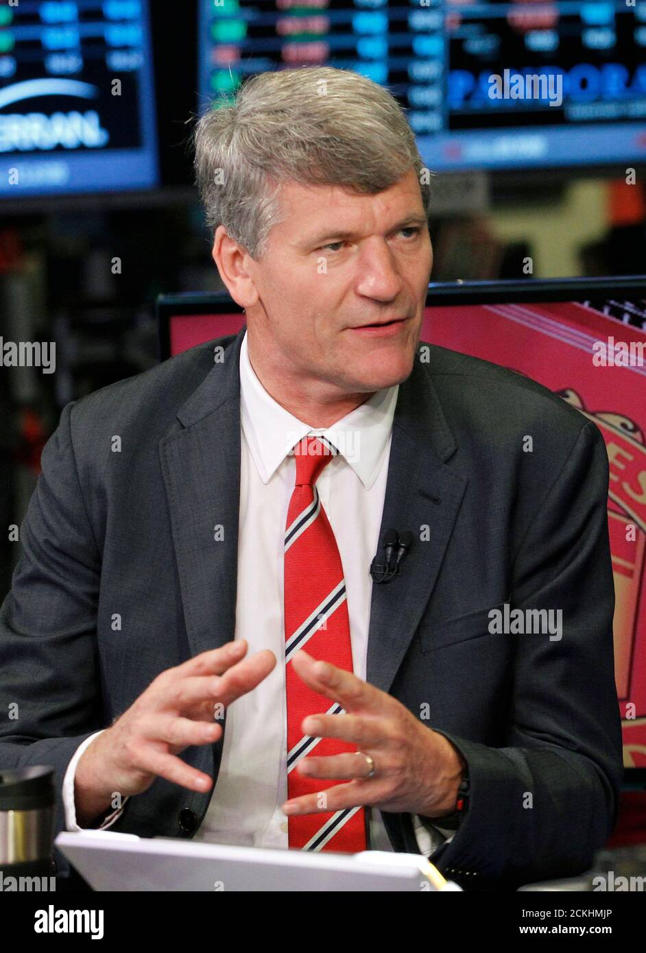 Manchester United CEO David Gill gives an interview following Manchester United Ltd initial public offering on the floor of the New York Stock Exchange, August 10, 2012. Shares in Manchester United priced below expectations and were essentially flat in early trading on Friday, a disappointing stock market debut for the world's most famous soccer club and most valuable sporting team. REUTERS/Brendan McDermid (UNITED STATES - Tags: BUSINESS SPORT SOCCER) Stock Photo