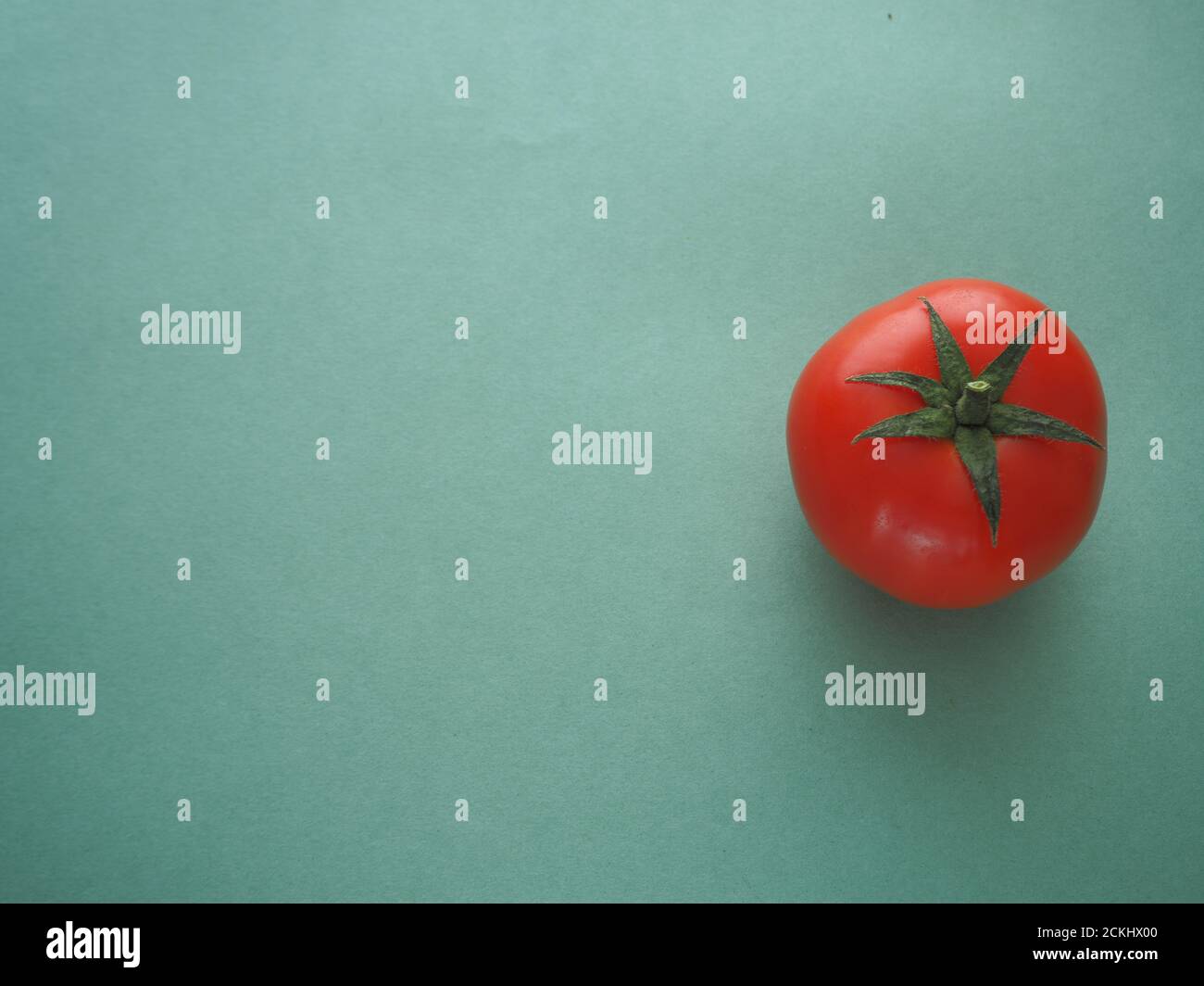 Red tomato close-up. Stock Photo