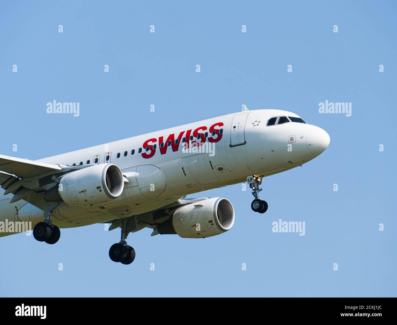 Swiss A320 Landing at ZRH Stock Photo