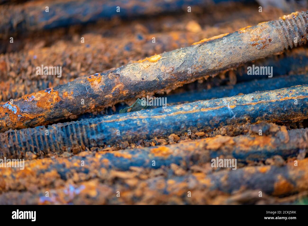 Old metal studs covered in rust, close-up, selective focus Stock Photo