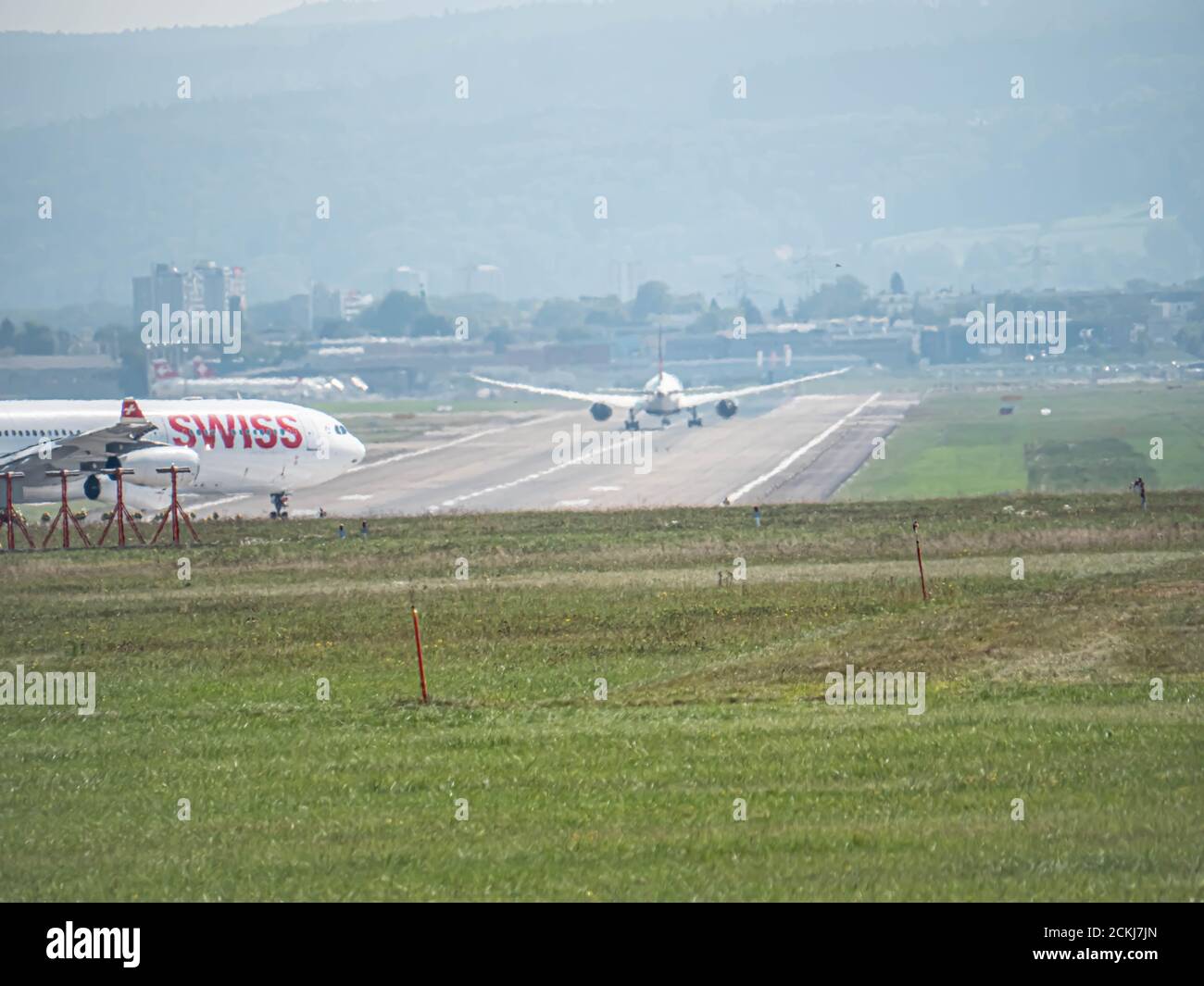 Swiss Airplane Landing at Zürich Airport Stock Photo